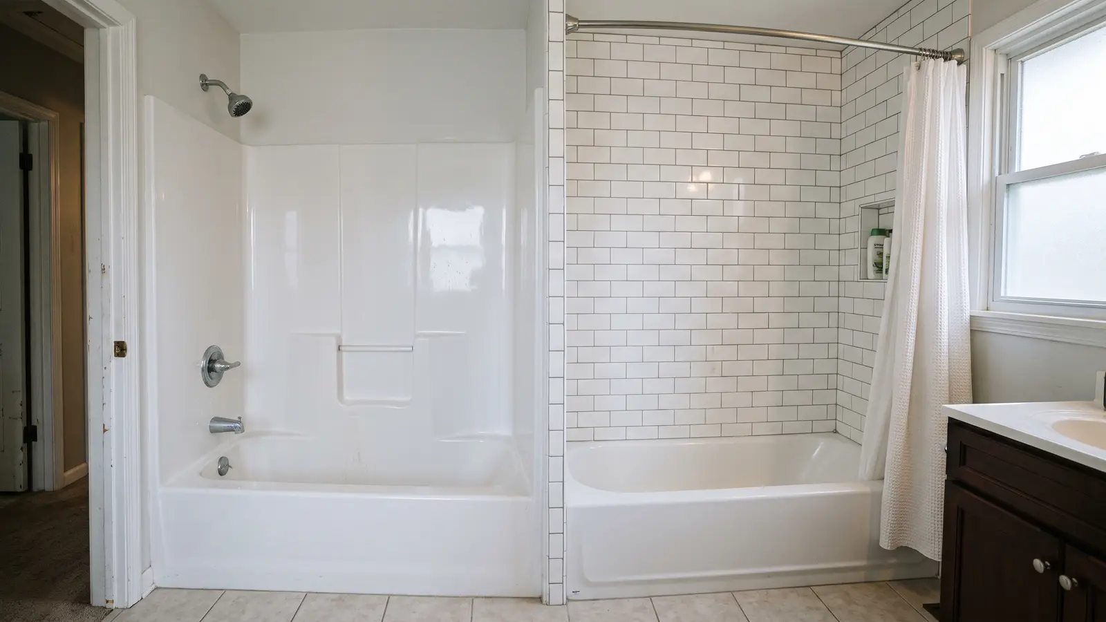 Acrylic tub surround on one side of an alcove next to a custom tiled wall